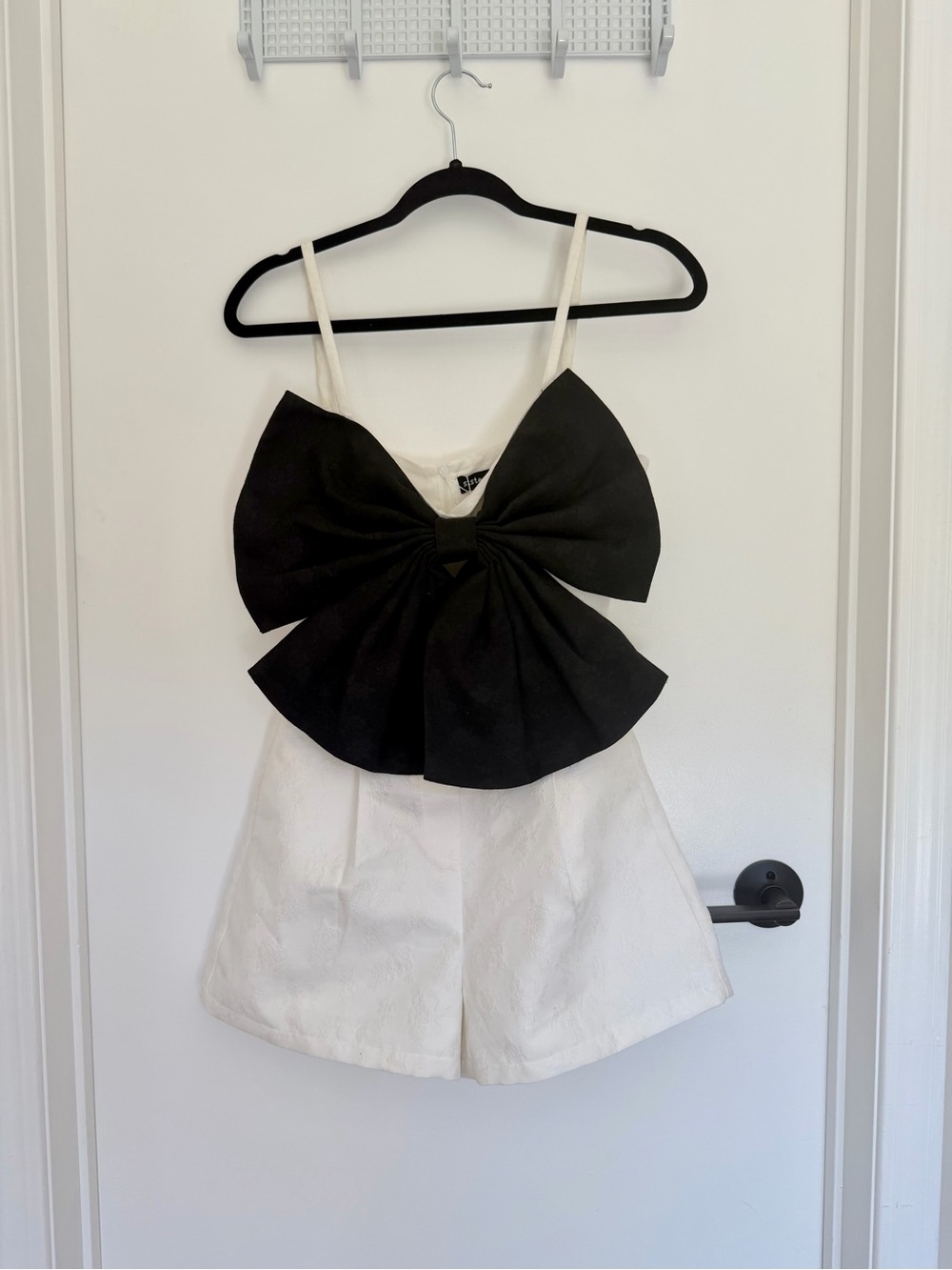 White Romper with Dramatic Black Bow